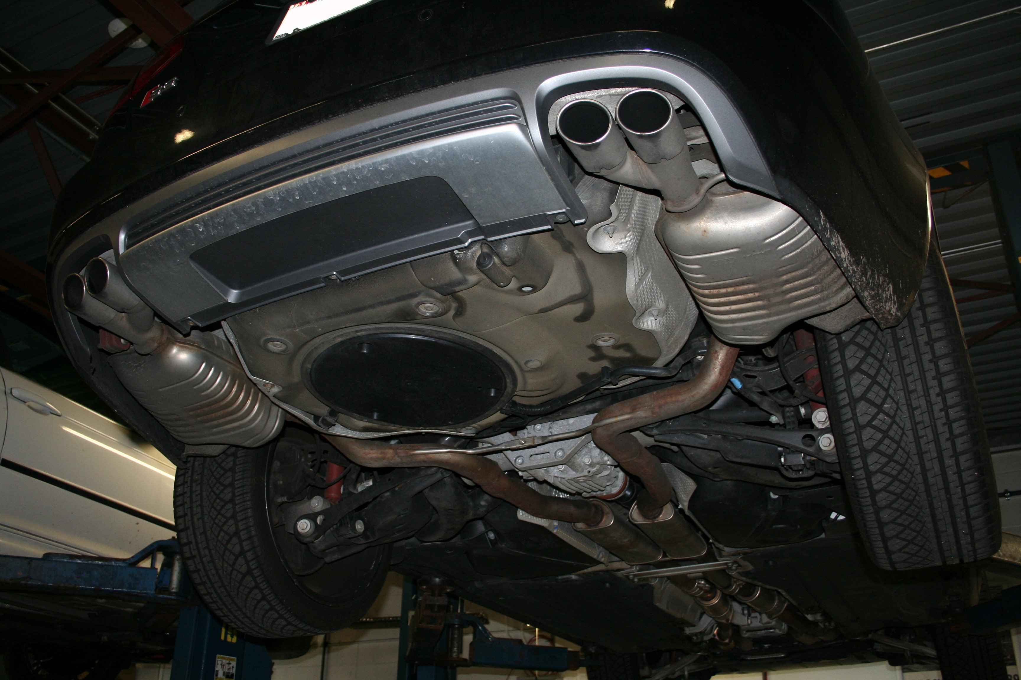 Audi S6 exhaust install. | Autobahn Performance Inc.